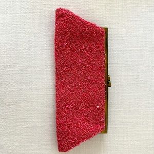 Hot pink beaded clutch